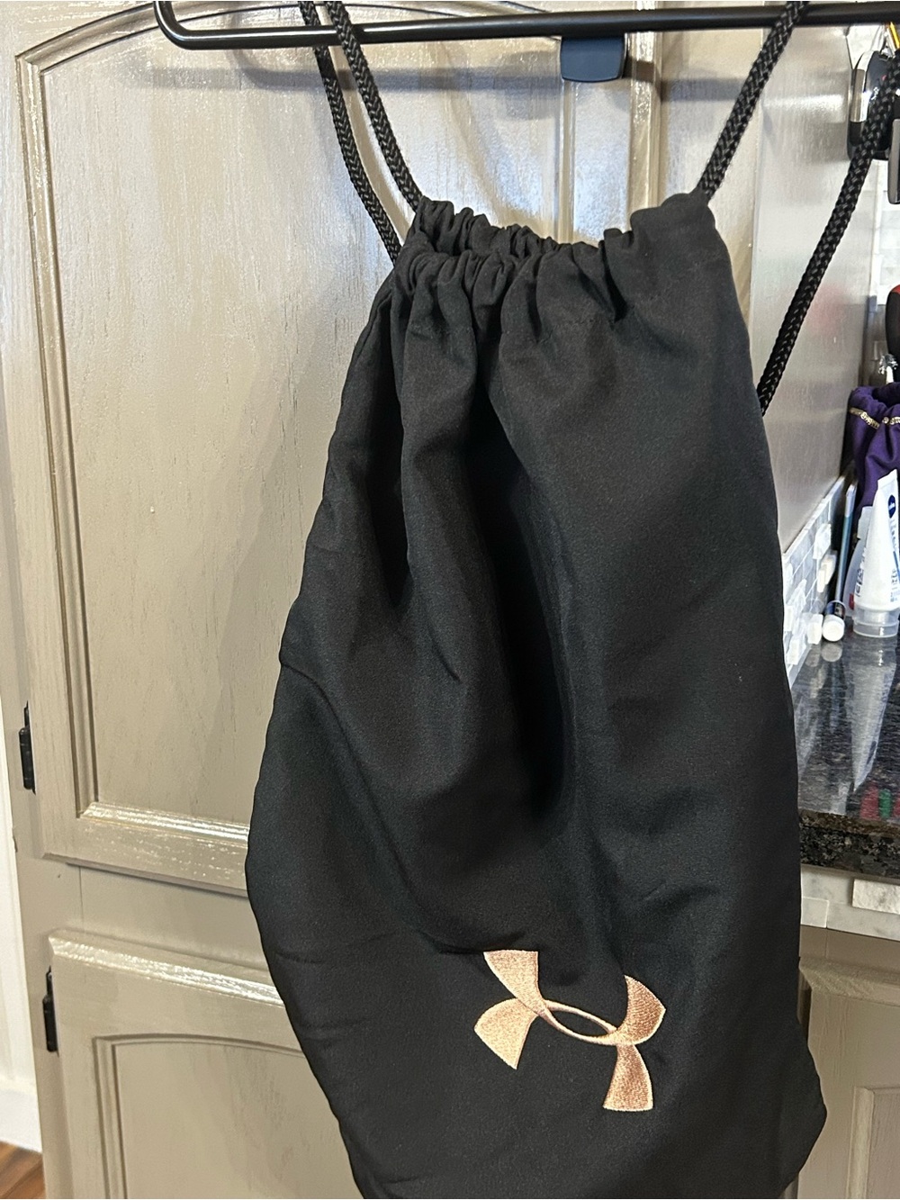 Under Armour Black Drawcord Backpack with Metallic Rose Logo